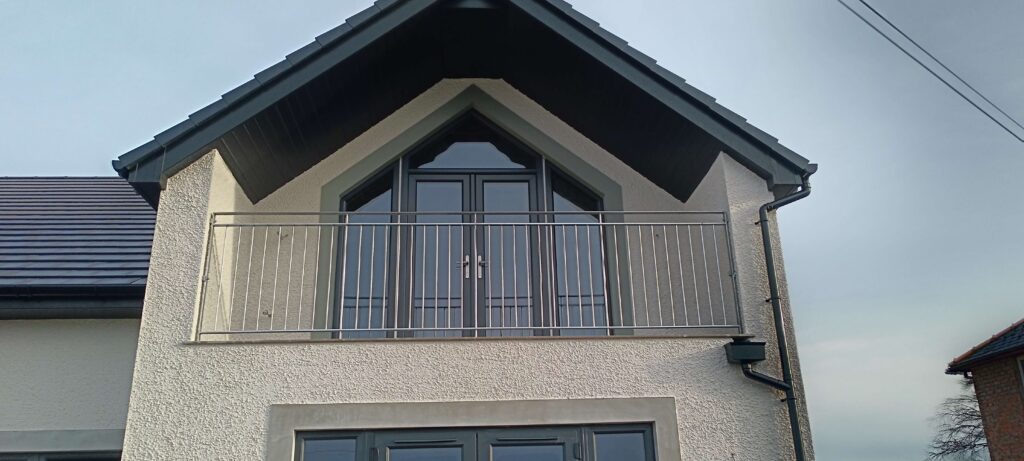 Steel balcony railing installed on new build house near Thursby Carlisle Cumbria