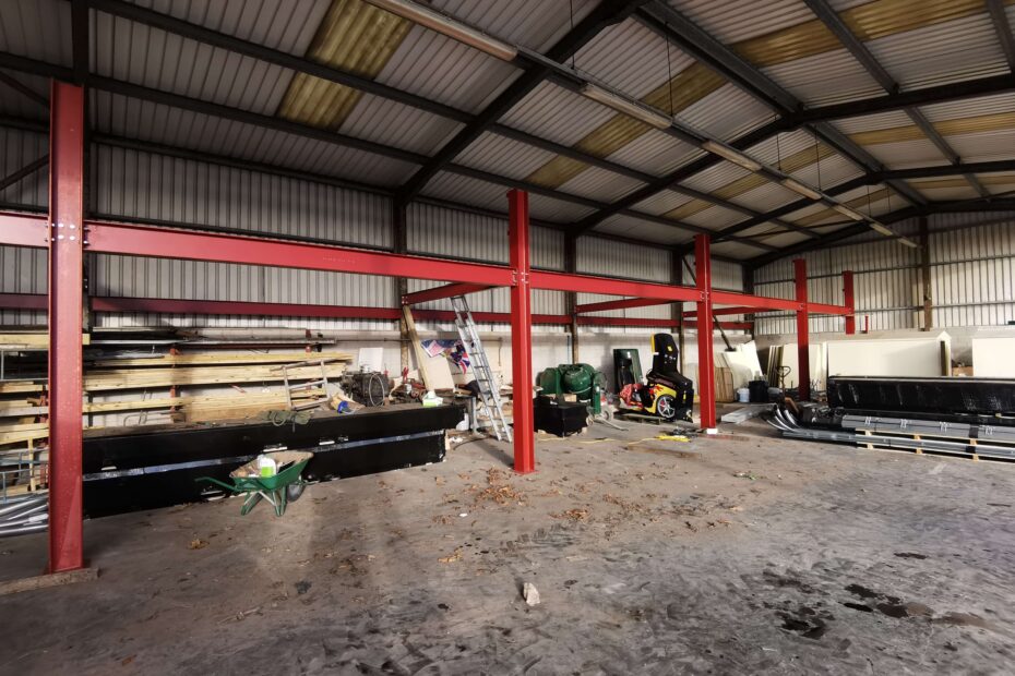 Steel mezzanine floor with staircases installed in commercial building in Cumbria