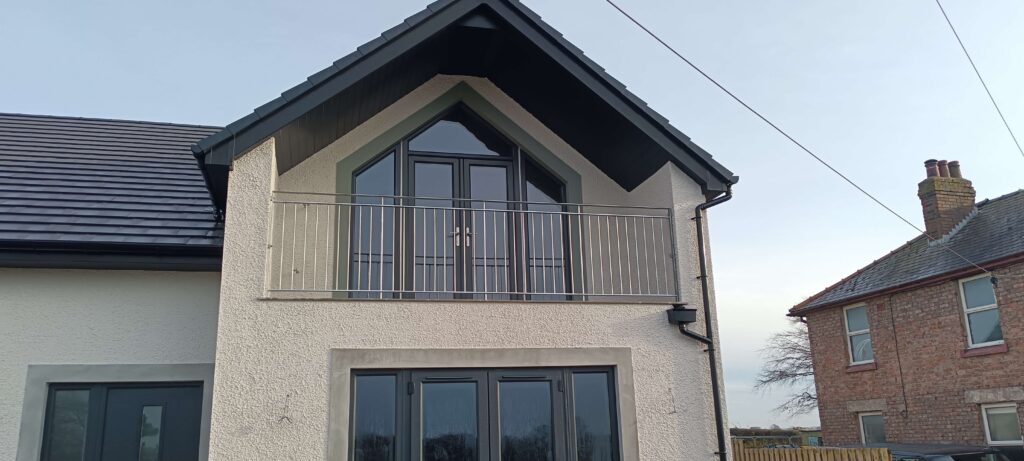 Bespoke balcony railing fabricated and installed by J Johnstone Engineering