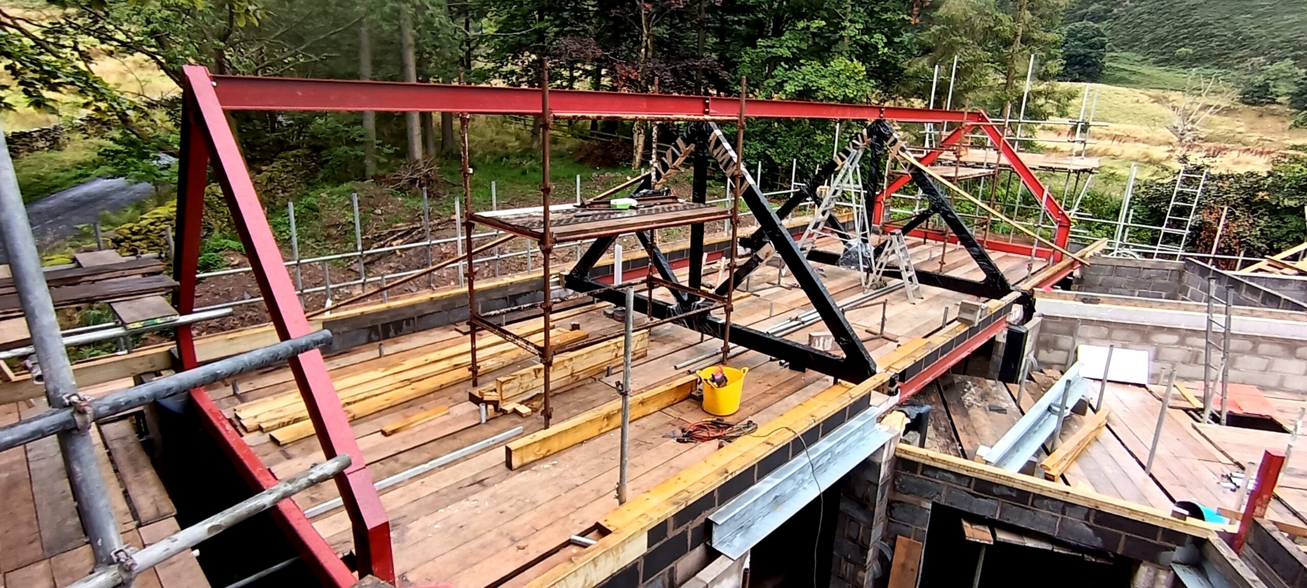 Structural steel portal frames installed for new build home in Watermillock Lake District Cumbria